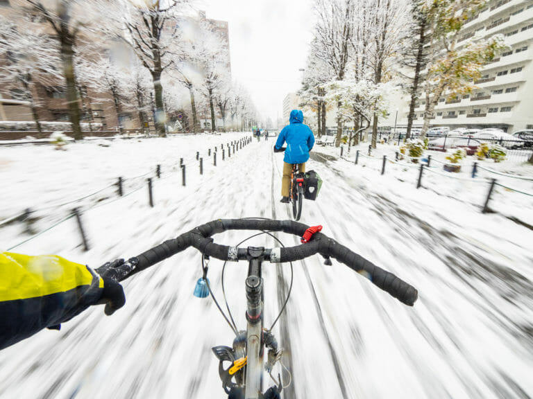Cycling in the snow in Sapporo City (Hokkaido, Japan)